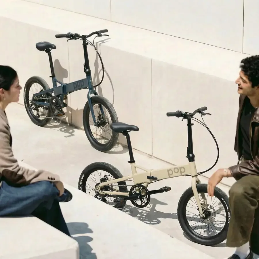 Two POP bikes with riders